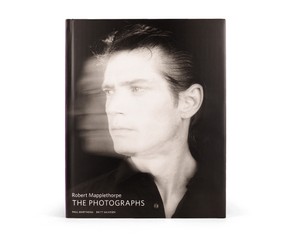 Книга "The Photographs"